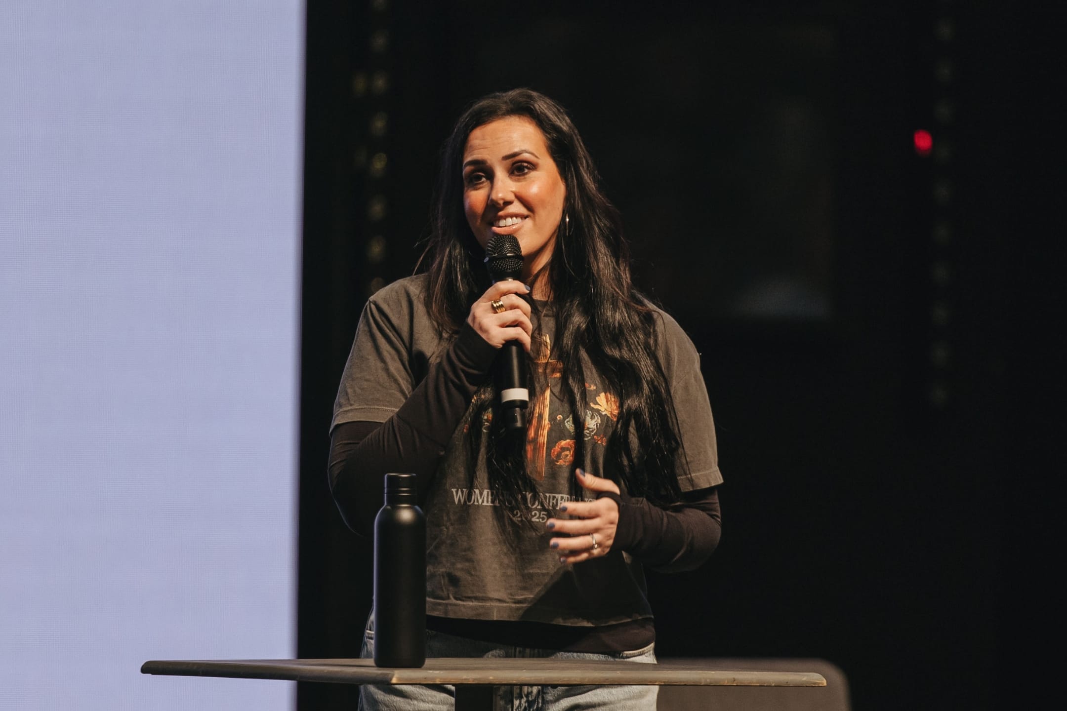 Jessica Koulianos speaking to conference attendees