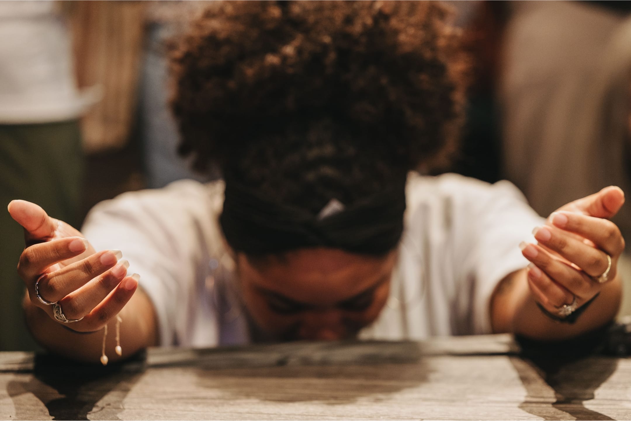 Womain kneeling in prayer